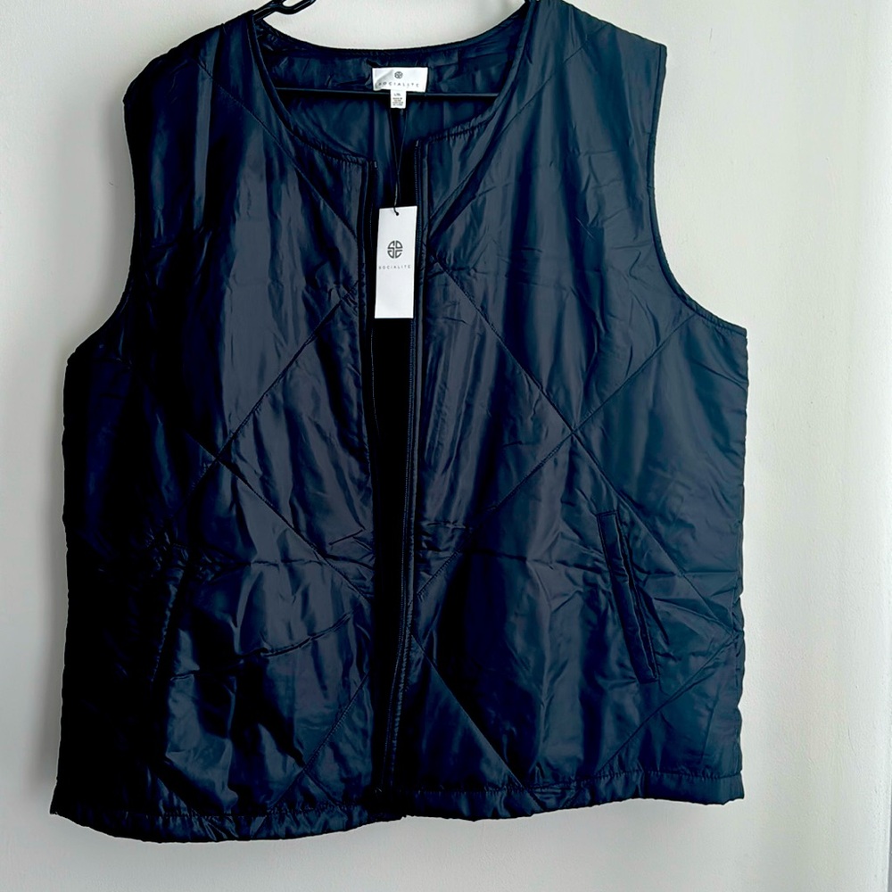 L/XL. Light weight vest BRAND NEW